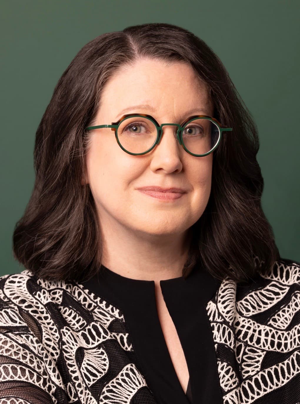 Lenore MacAdam wearing distinctive green glasses